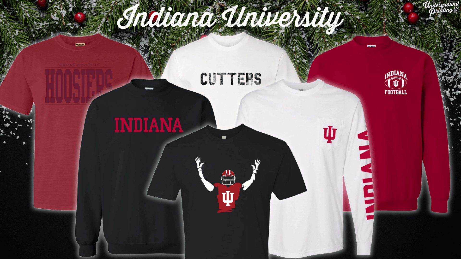 A selection of Indiana University apparel displayed on a holiday-themed background, featuring t-shirts, long sleeves, and sweatshirts with "Hoosiers," "Indiana," and IU football designs in red, black, and white.