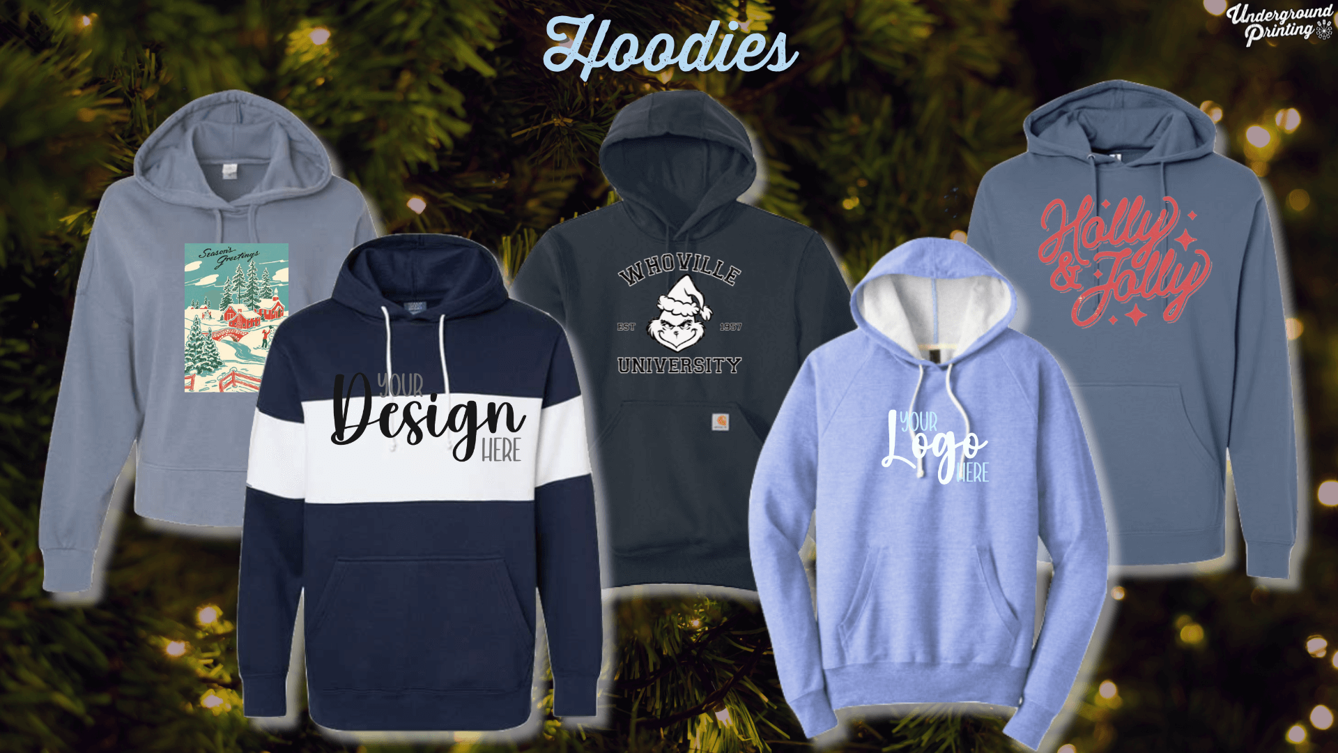 A variety of customized holiday hoodies displayed on a festive background, including designs such as a snowy cabin scene, "Whoville University," "Holly & Jolly," a blue hoodie with "Your Logo Here," and a color-block navy and white hoodie with space for a custom design.