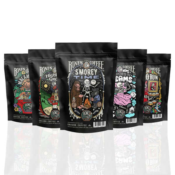 Assorted lineup of Bones Coffee flavors with vibrant illustrated packaging