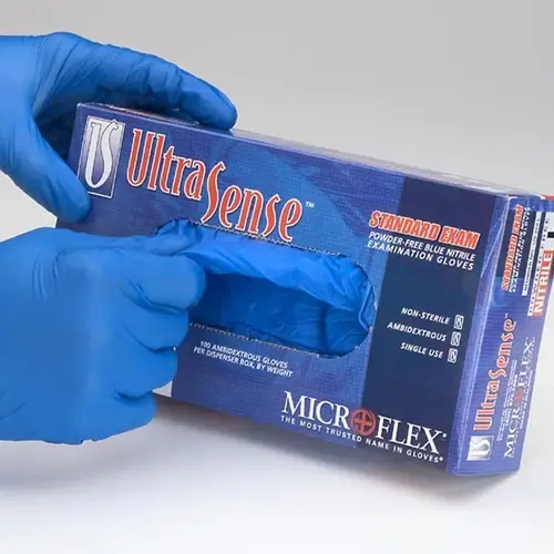 Latex -free gloves that are blue on a model, next to a box.