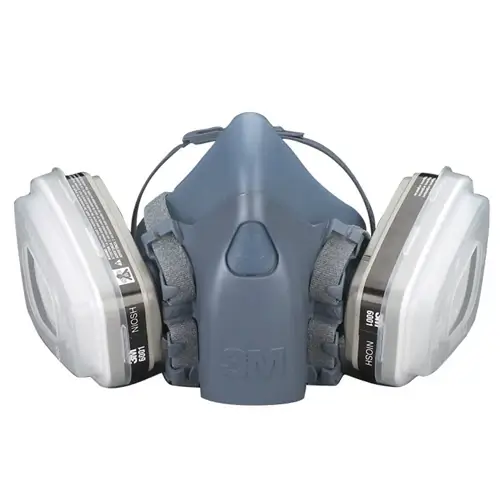 3M Half Facepiece Respirator 7502, a comfortable, reusable respirator designed for protection against fumes, dust, and airborne contaminants in jewelry studios.