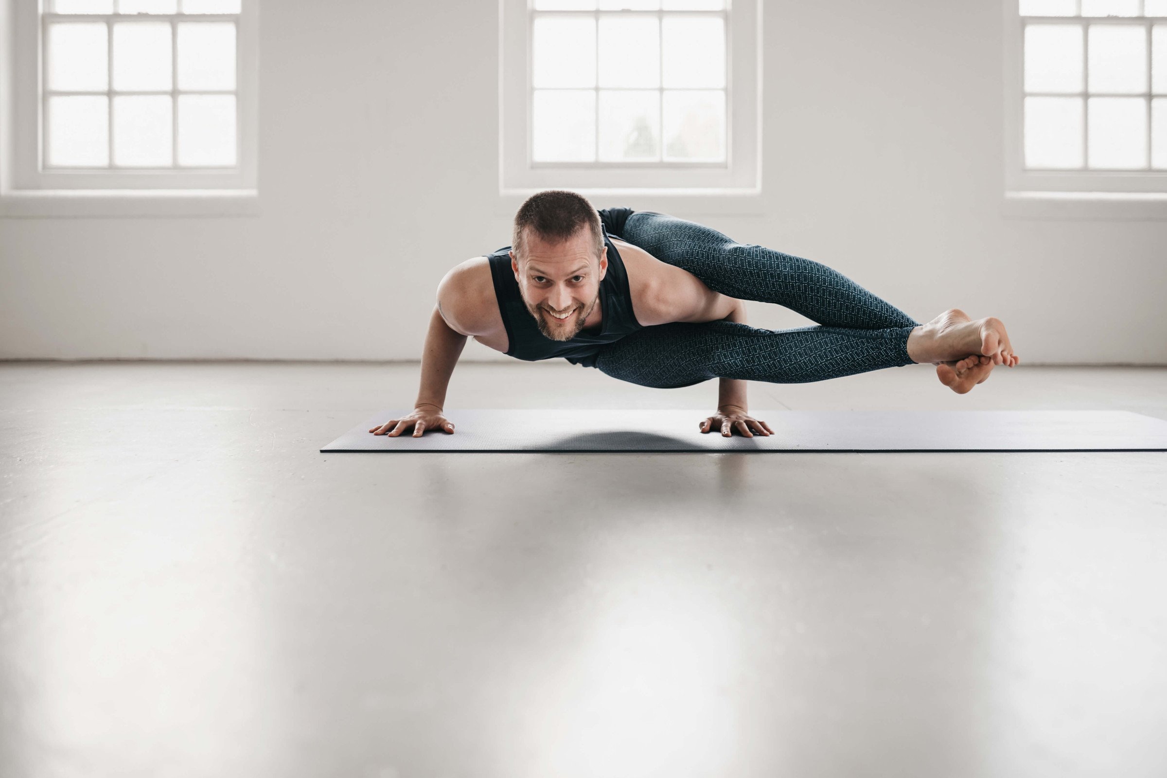 Forrest Yoga teacher, Craig Norris in Eigth-Angle Pose "Astavakrasana" 