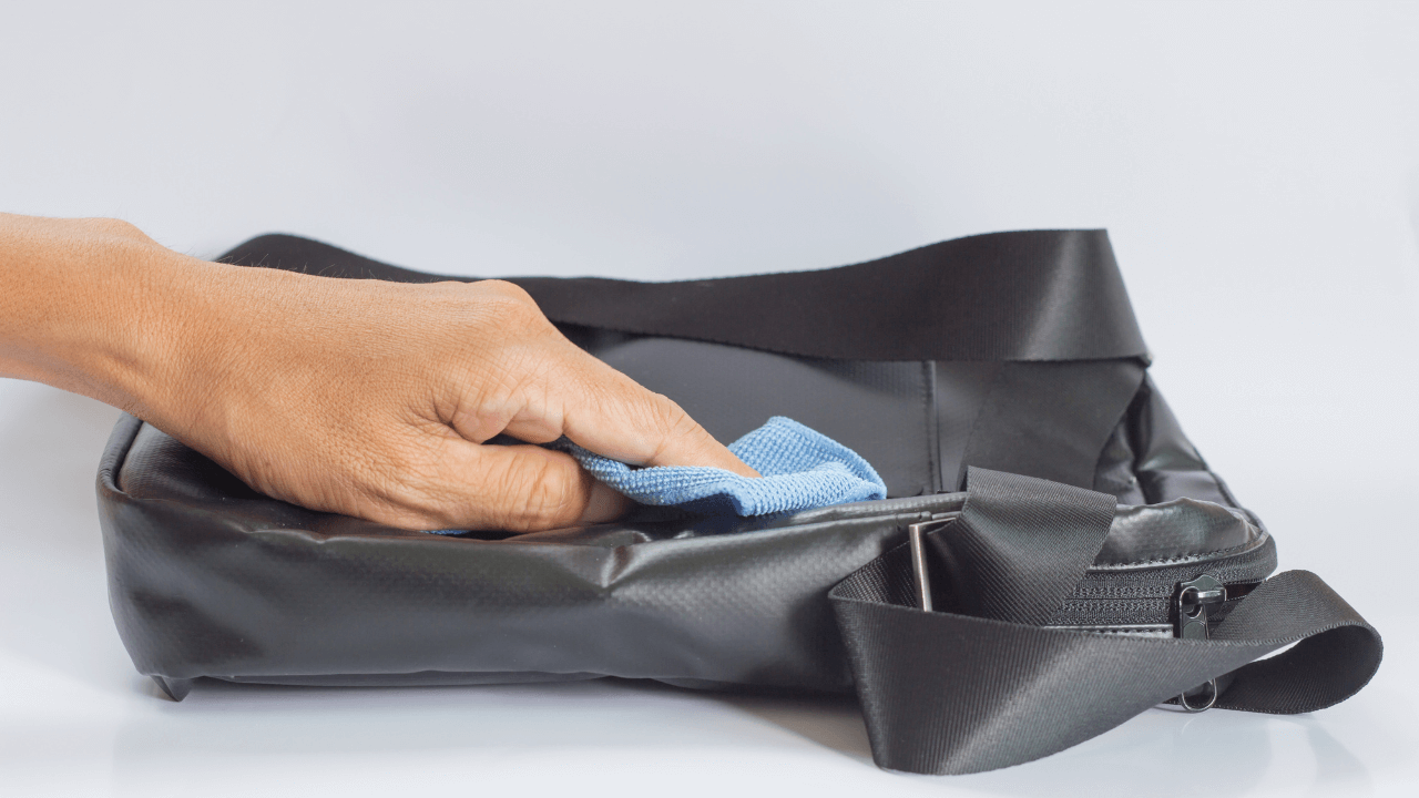 blotting leather bag with a dry cloth