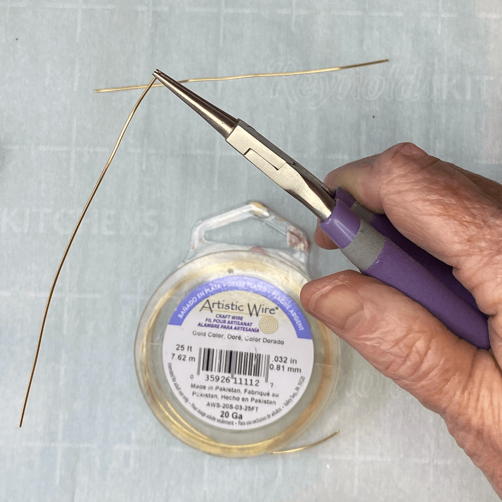 The artistic wire and needle nosed pliers we'll use to make the polymer clay earrings