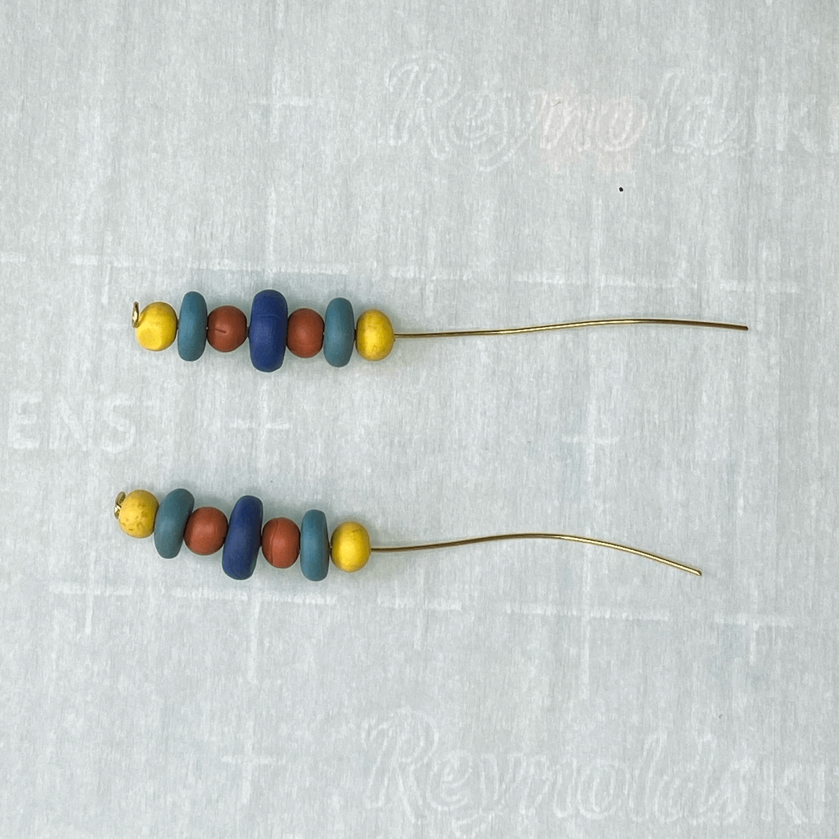 Polymer clay beads strung on the wire.