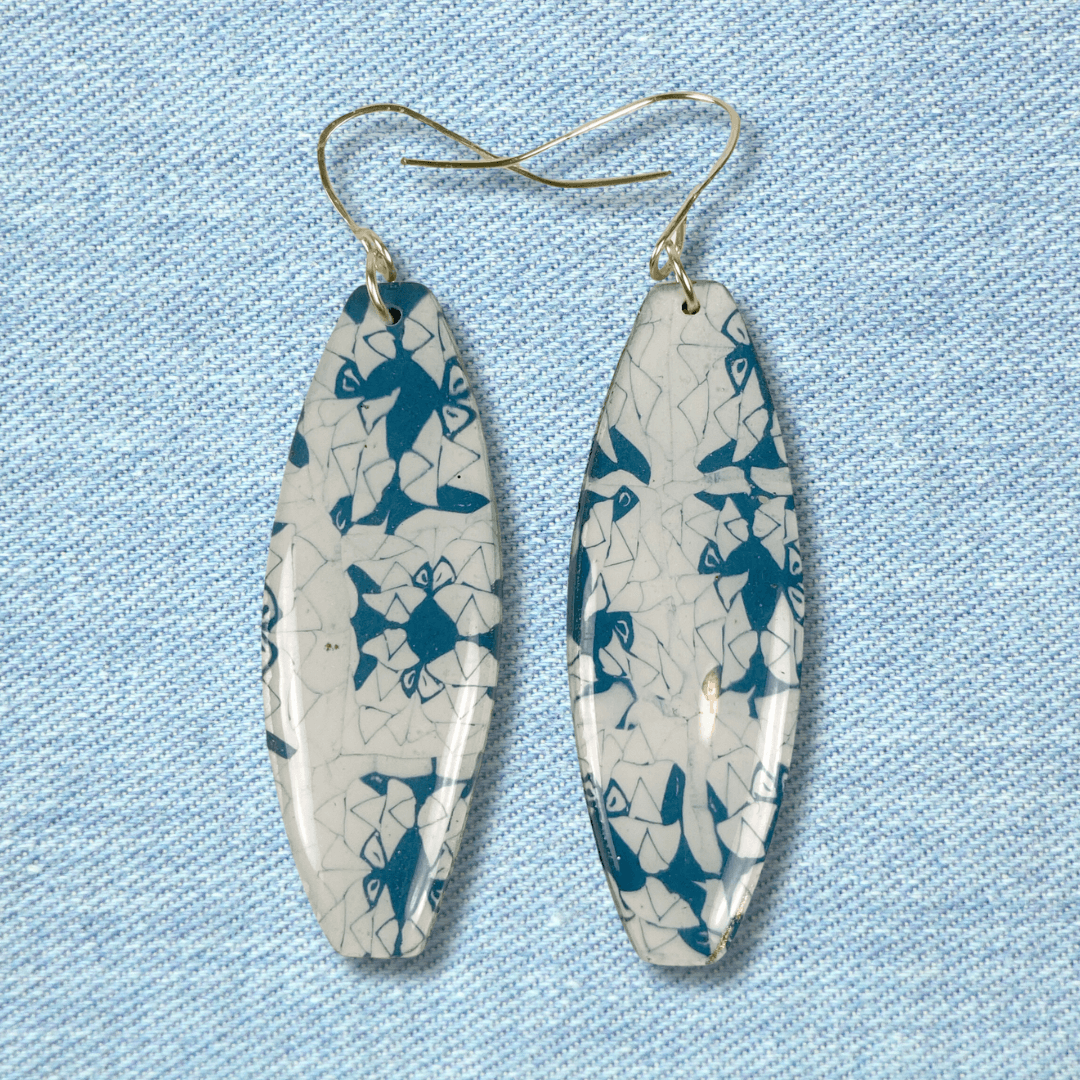 The finished denim and white earrings