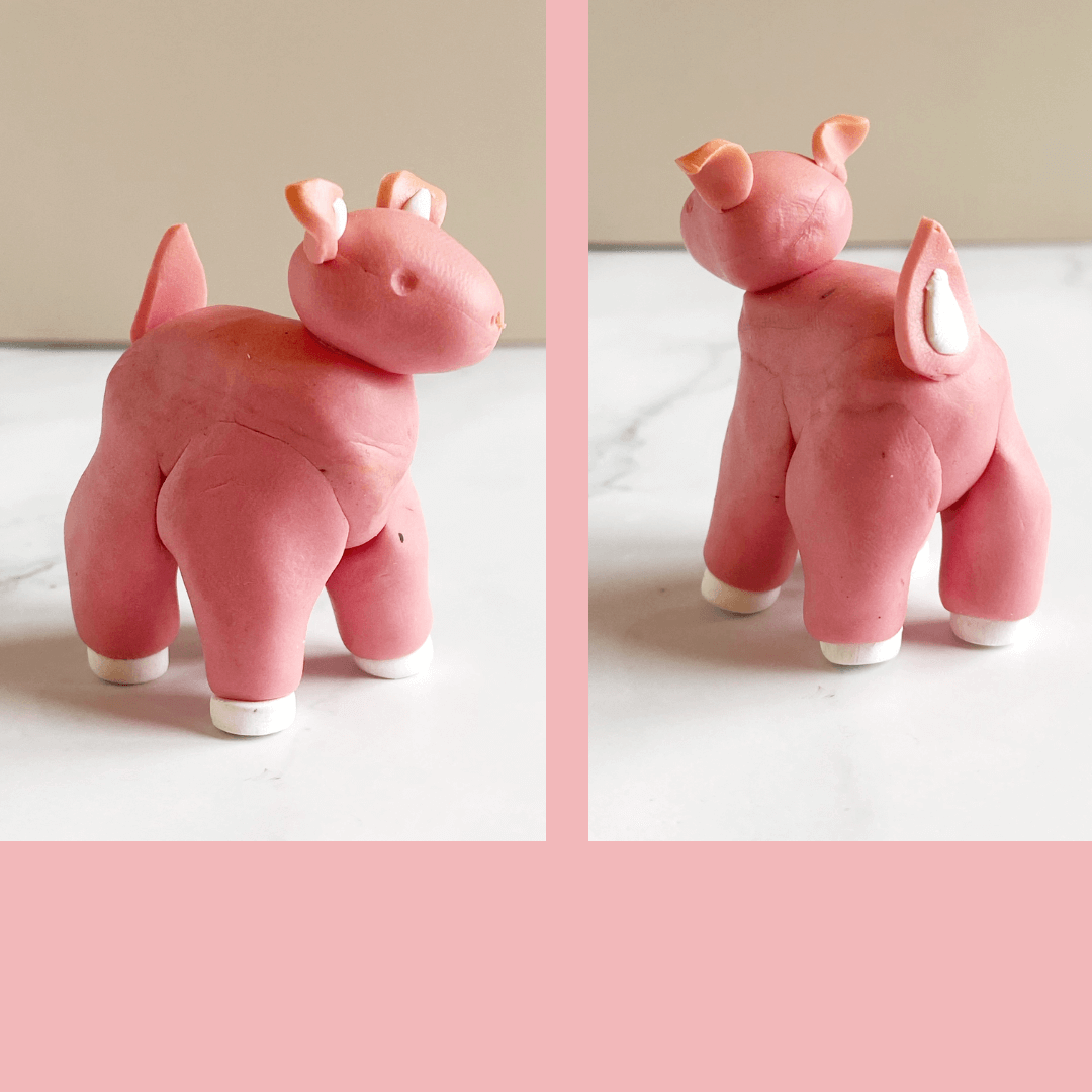 A misshapen pink polymer clay deer with adorable white hooves and accents on tail and ears