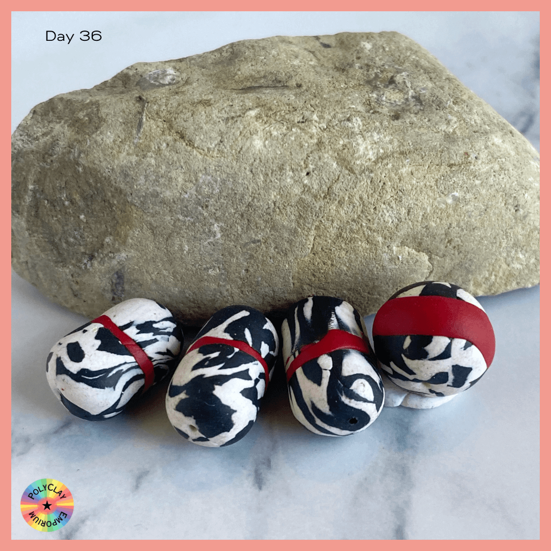 Black & White marbled beads with red equators
