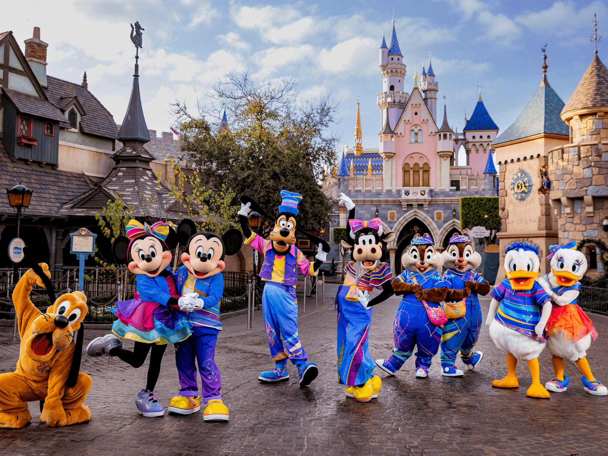 Mickey Mouse, Minnie Mouse, Pluto, Goofy, Clarabelle Cow, Chip and Dale, Donald Duck, and Daisy Duck in their Disneyland's 70th Anniversary Outfits