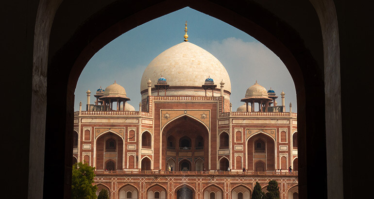 A front view of the entrance and dome of Humayuns tomb in Delhi, India