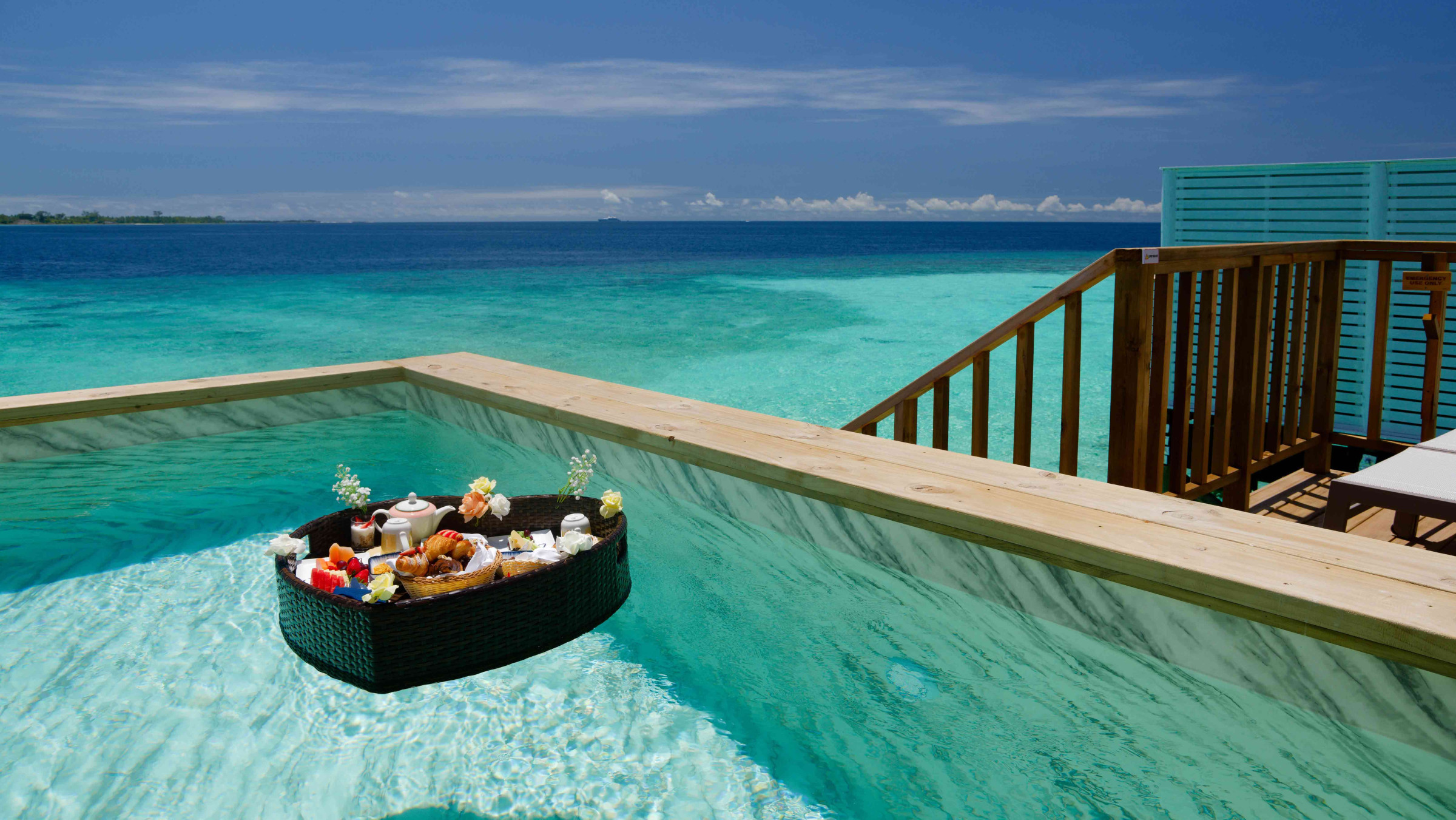 A private pool at OBLU NATURE Helengeli by SENTIDO, a Colours of OBLU property, with a floating breakfast on its surface.