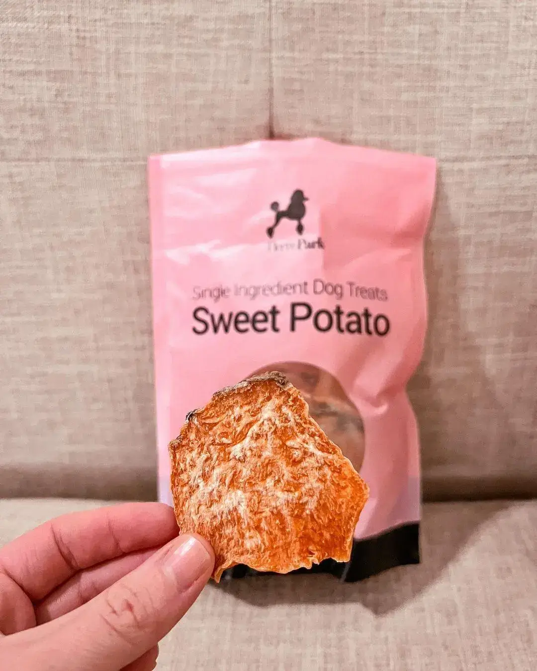 A close-up of homemade sweet potato dog treats, carefully crafted with a single, high-quality ingredient for a healthy and delicious treat.