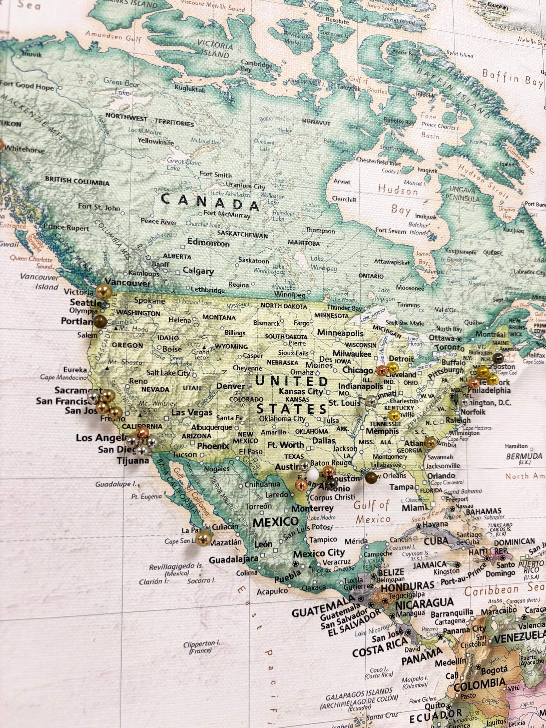 Push pin map used as alternative to wedding guest book