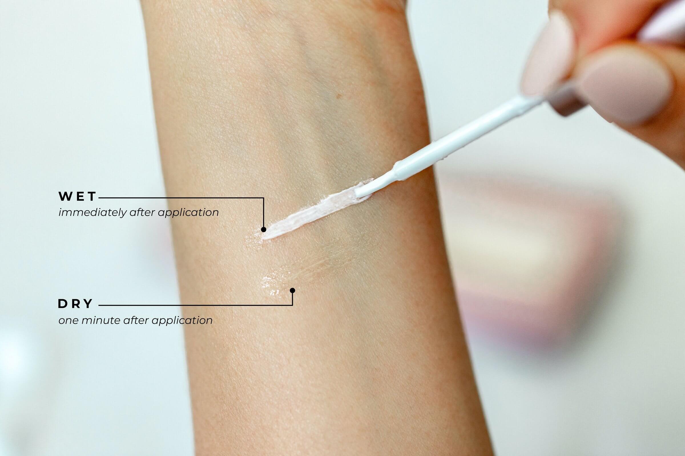 Applying the House of Lashes brush-on clear eyelash adhesive for natural lash look