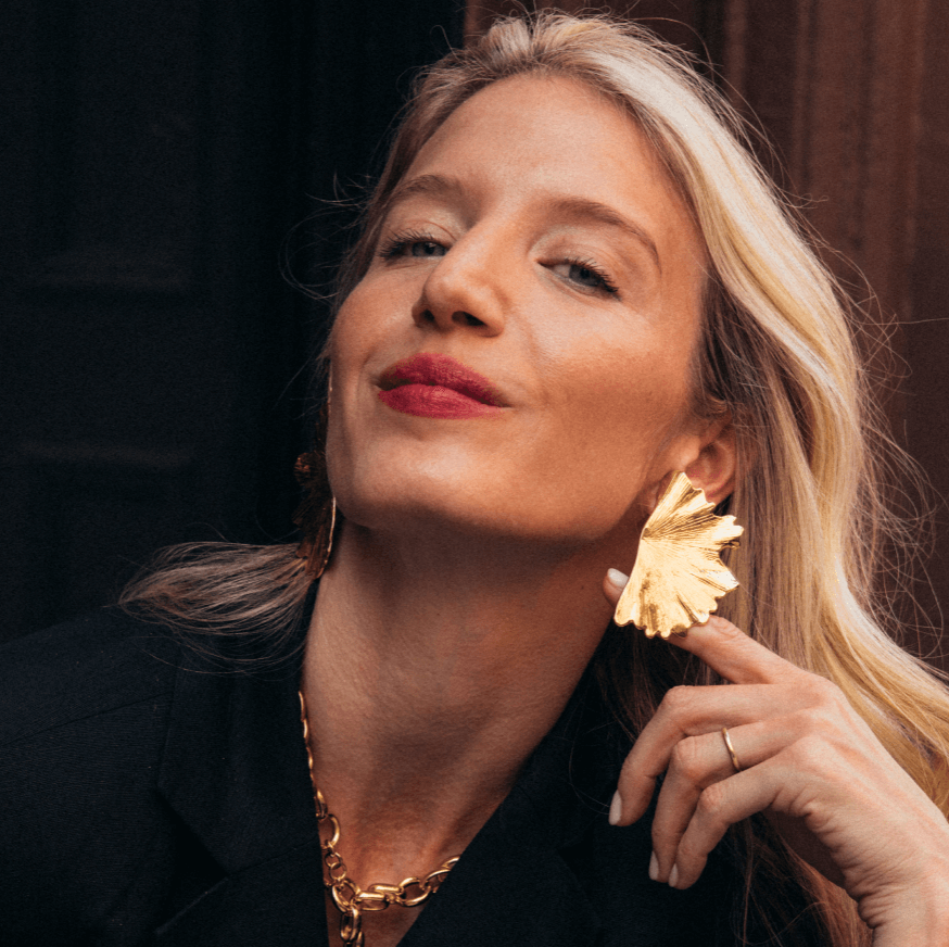 Model wearing Statement Earrings