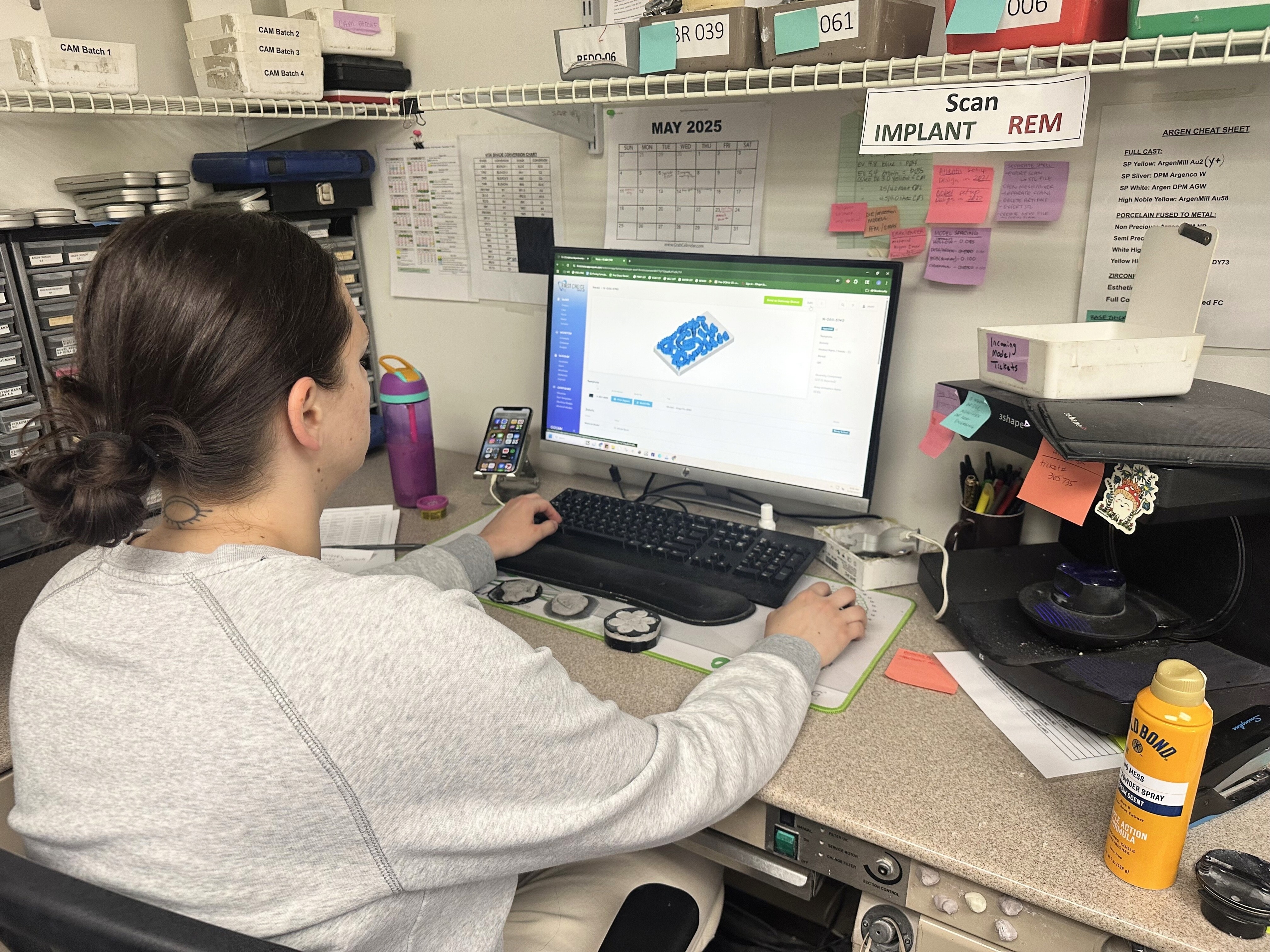 Technician using Oqcam software at First Choice Dental Lab