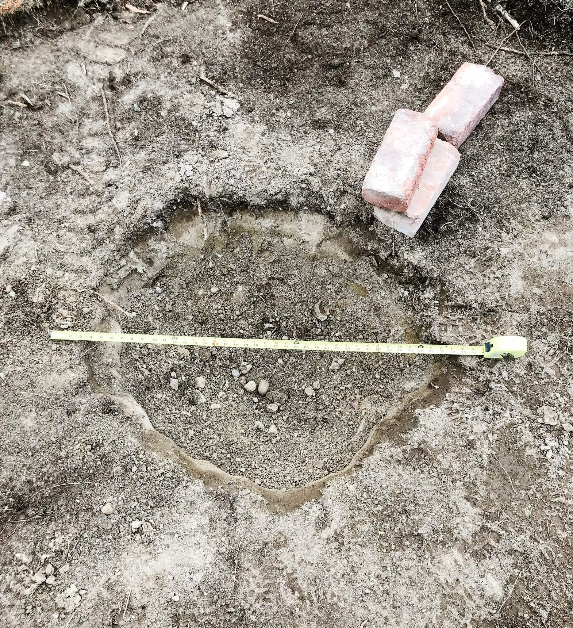 measuring land to build 48 inch fire pit 
