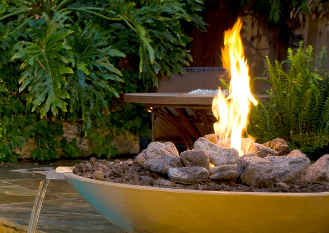 Benefits of a Fire Pit with Water Feature in Your Backyard