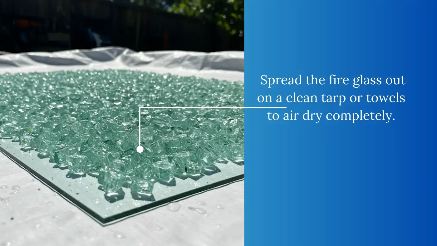 blue fire pit glass laid out on a towel to dry