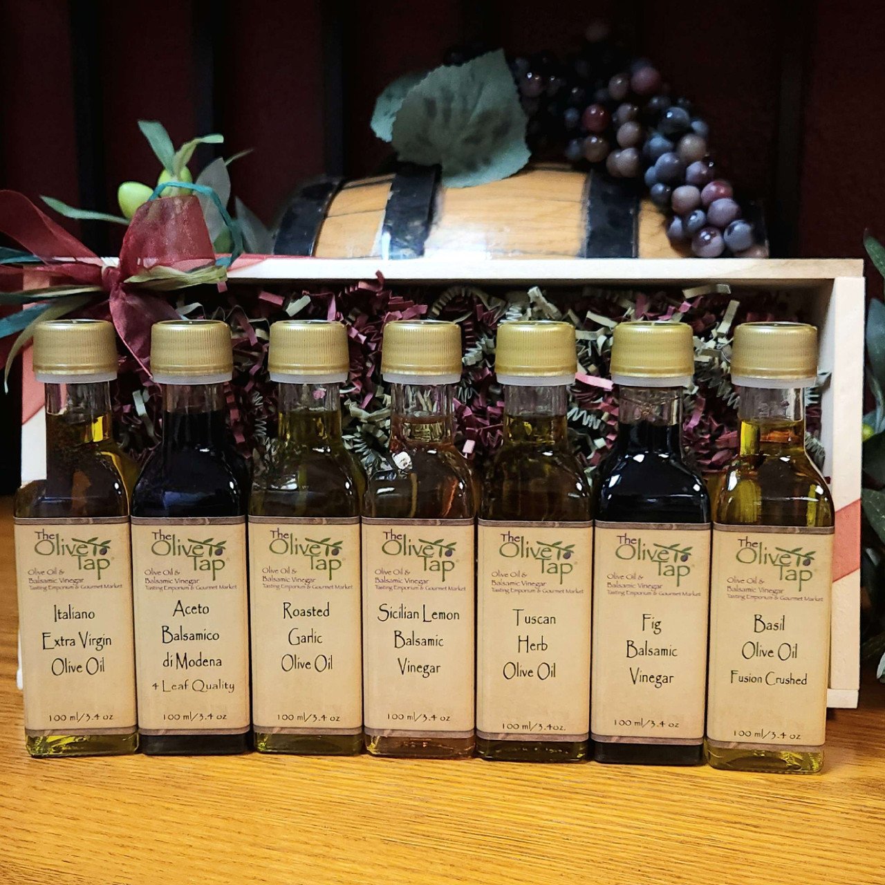 A 7 Bottle Oil and Vinegar Sampler in a Wood Box