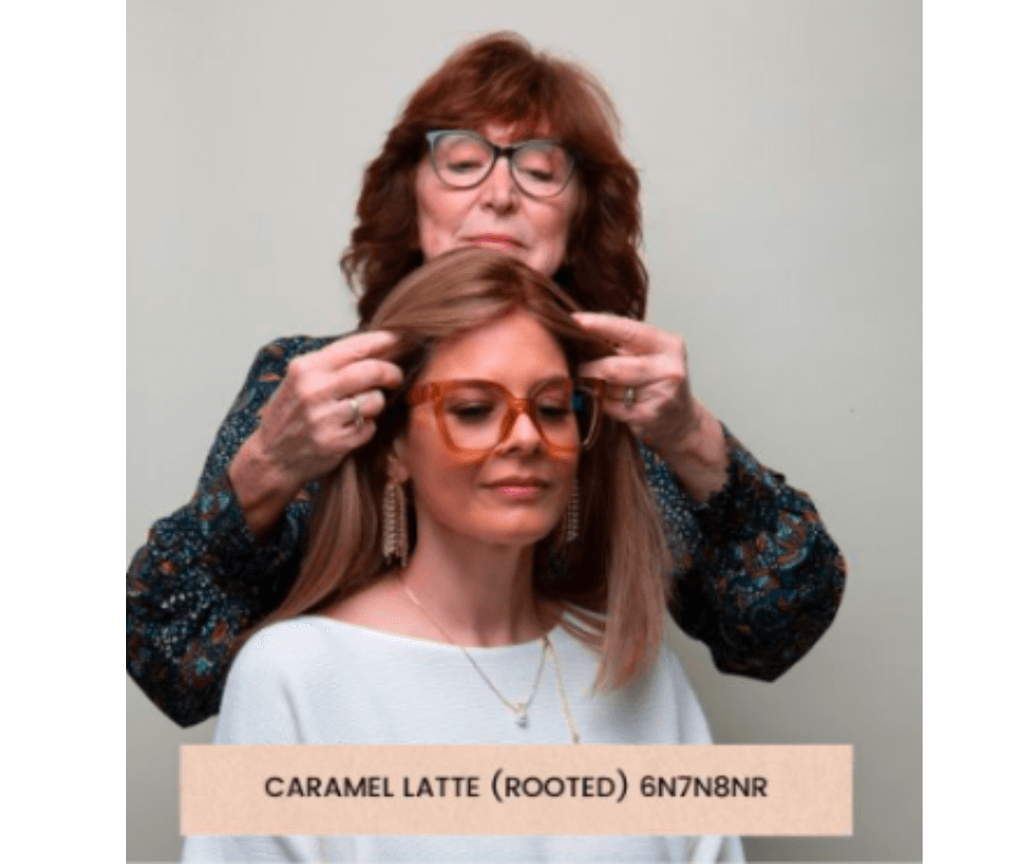 A woman is having a human hair topper applied by her stylist, demonstrating a professional hair transformation process.