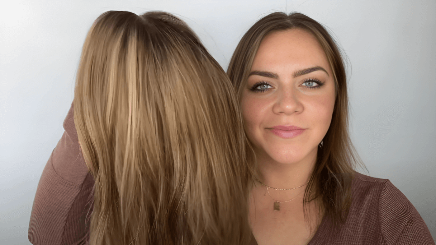 A woman showing what is a hair topper