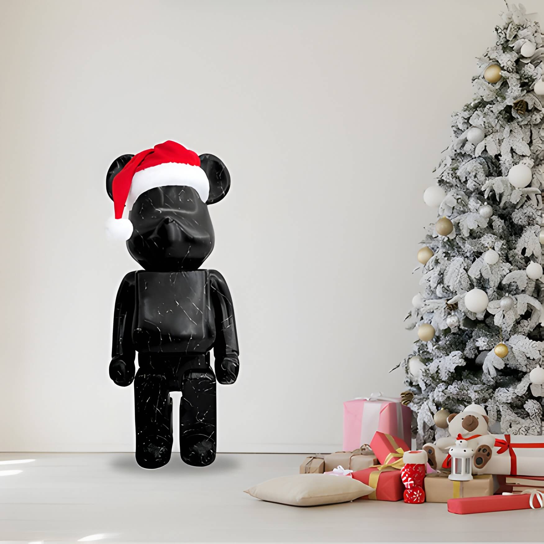a black giant bear sculpture wearing a santa hat next to a Christmas tree