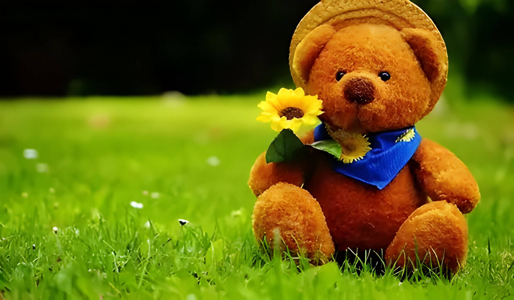a brown teddy wearing a straw hat with a yellow flower