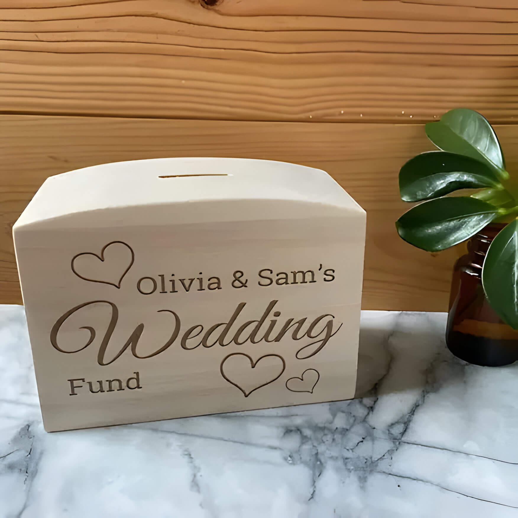 a wooden wedding fund box