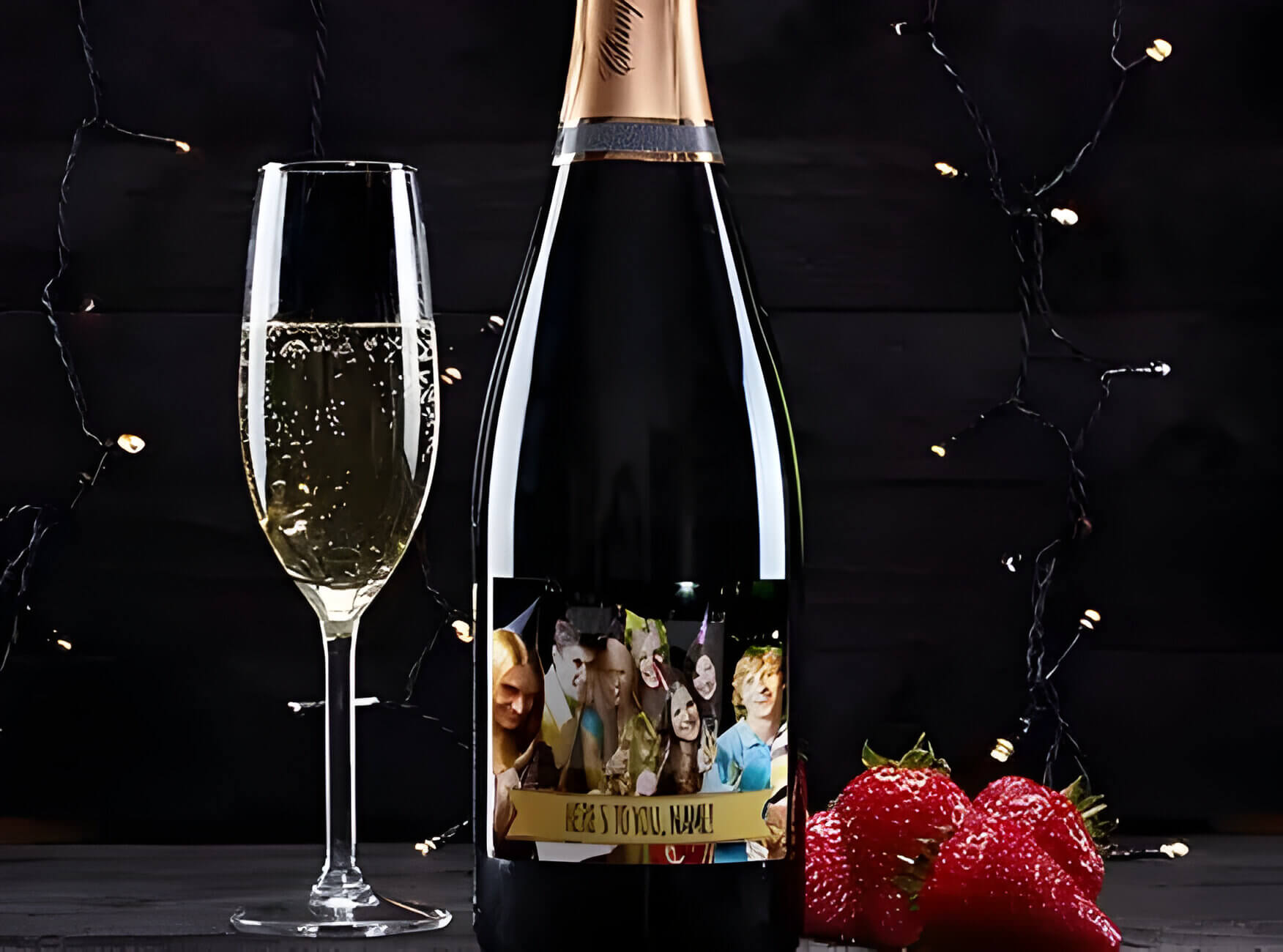 a personalised bottle of prosecco with a glass next to it