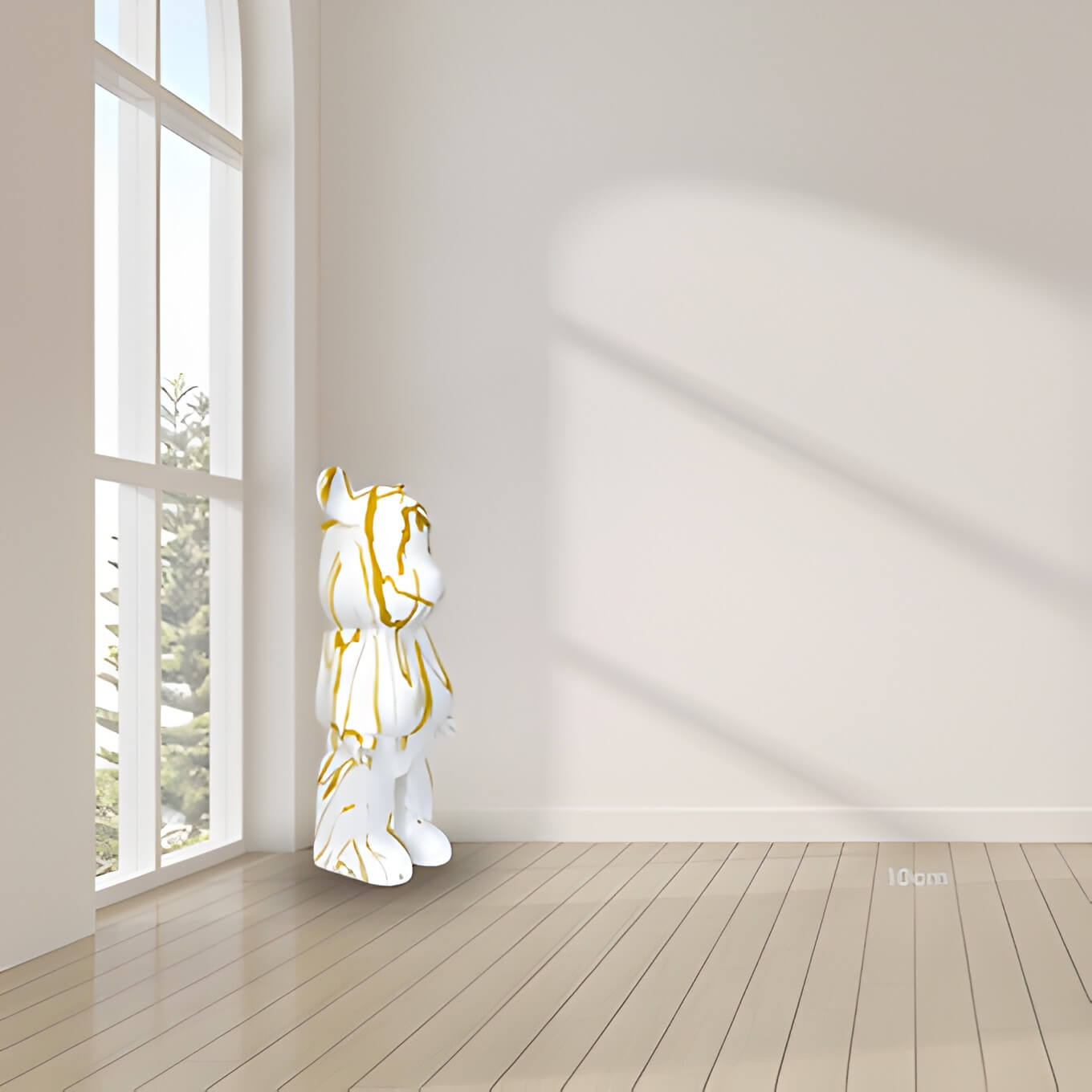 a pale pink home interior with a gold and white giant bear sculpture