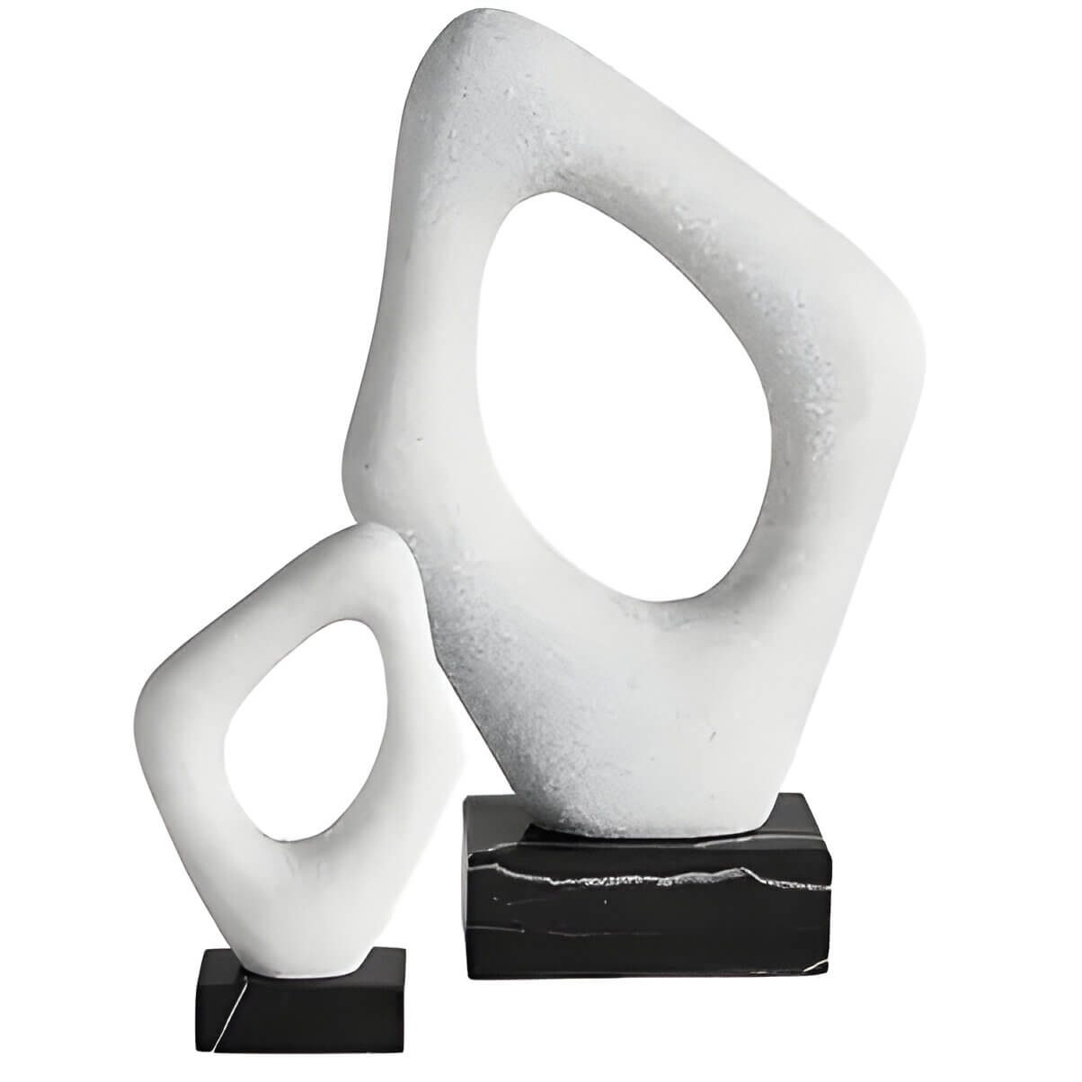 2 white and black stone sculptures