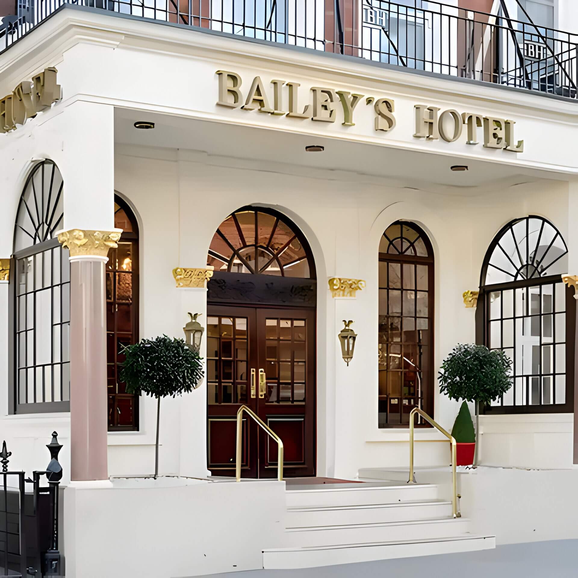the outside of the Bailey's hotel, a white building