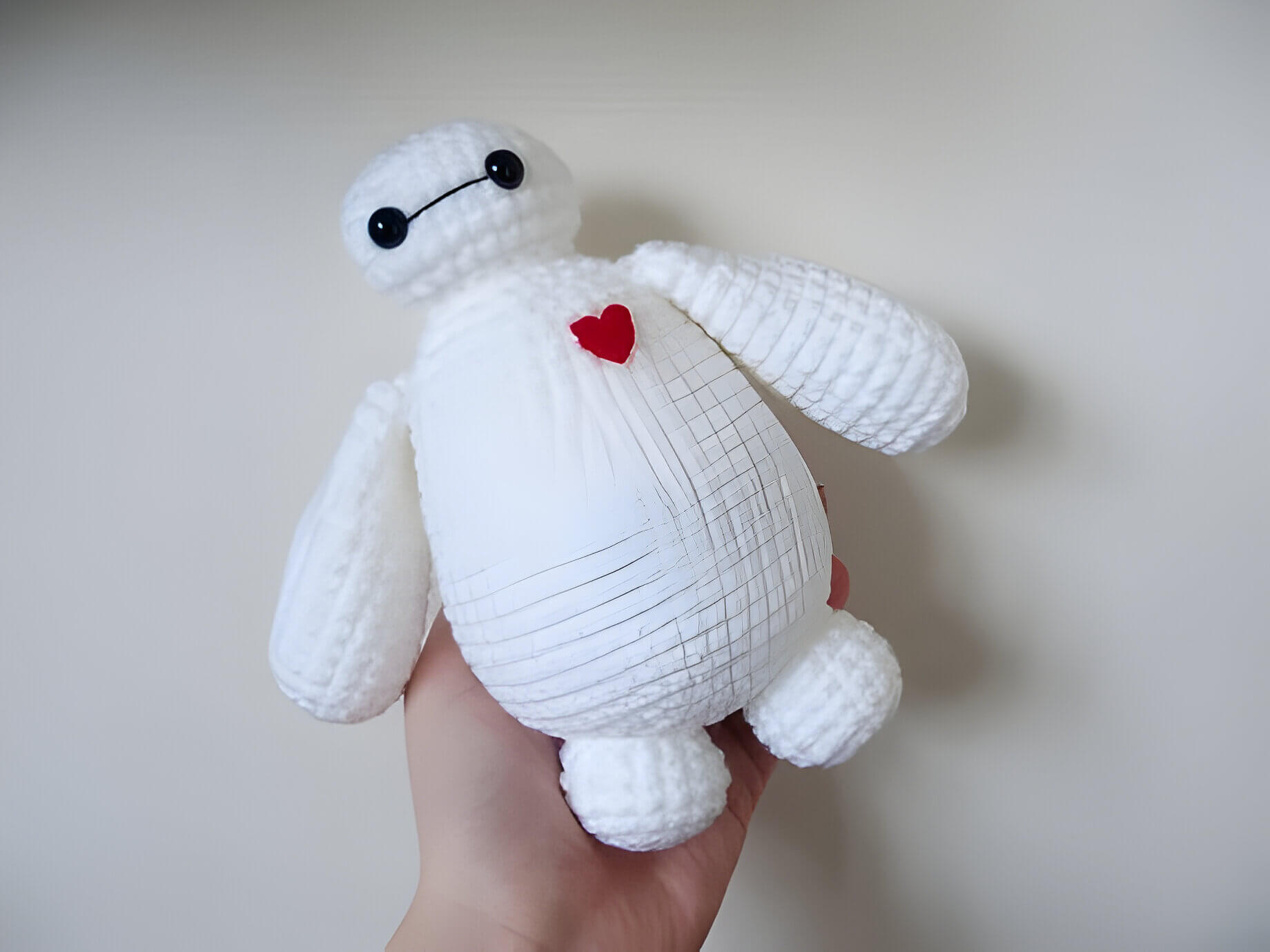 A white cuddly squishy Baymax crochet