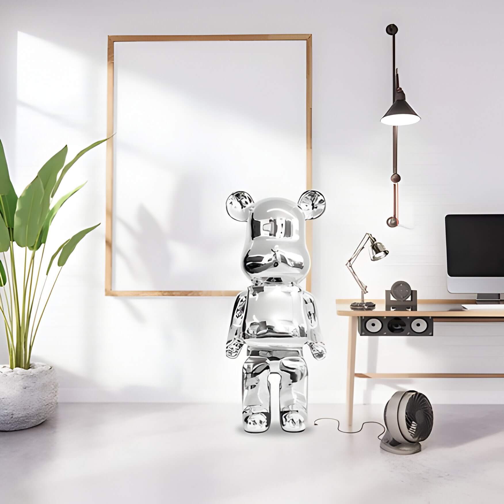 A chrome Giant Bear sculpture in an office