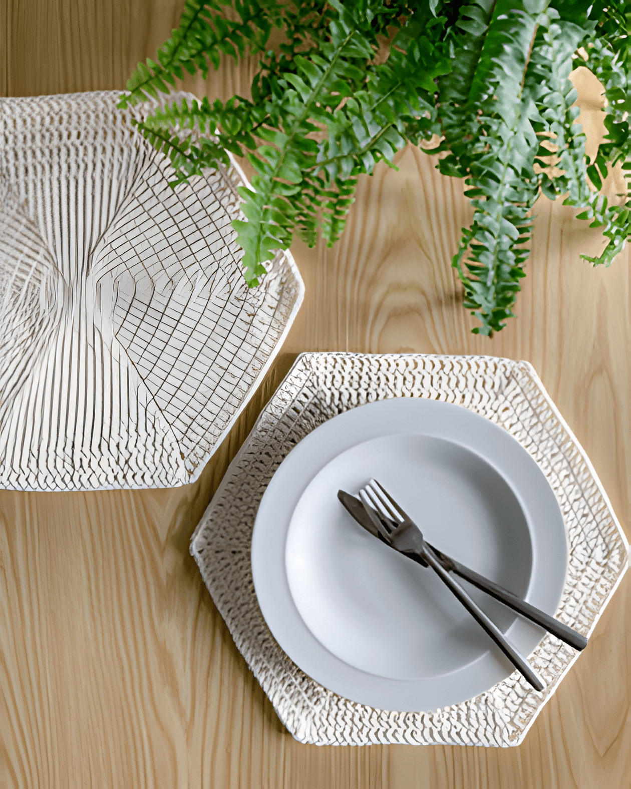 beige crochet table mats with a white dinner plate