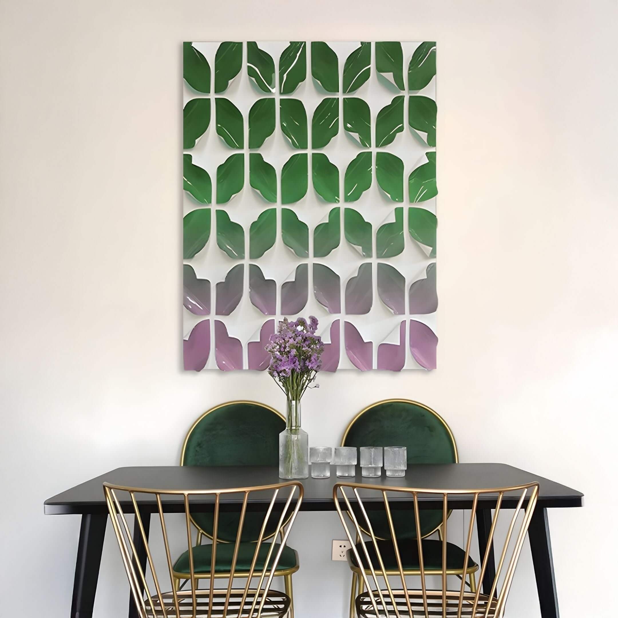 Dining room wall art featuring a geometric 3D acrylic design with layered green and purple leaf-like panels arranged in a grid above a modern table and chairs.