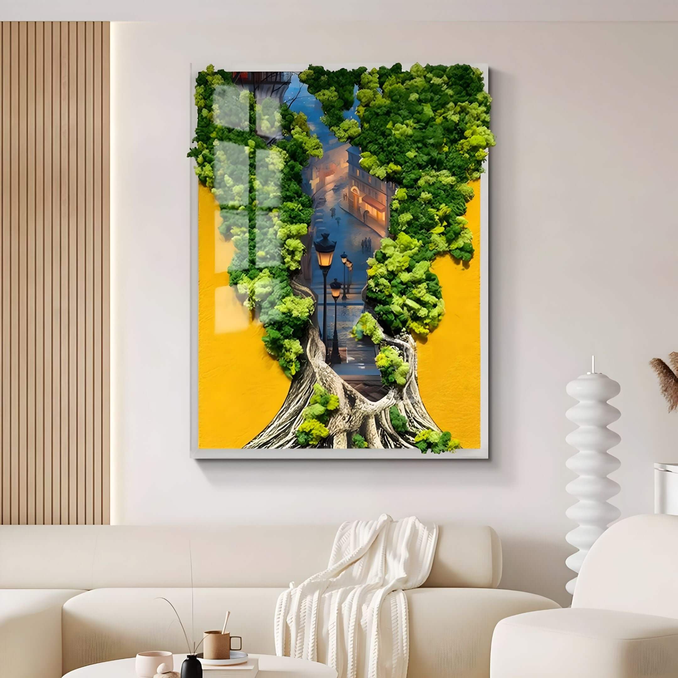Framed 3D wall art featuring a vibrant golden yellow backdrop with textured tree roots and lush green moss forming a silhouette that reveals a city street scene with lampposts and buildings.