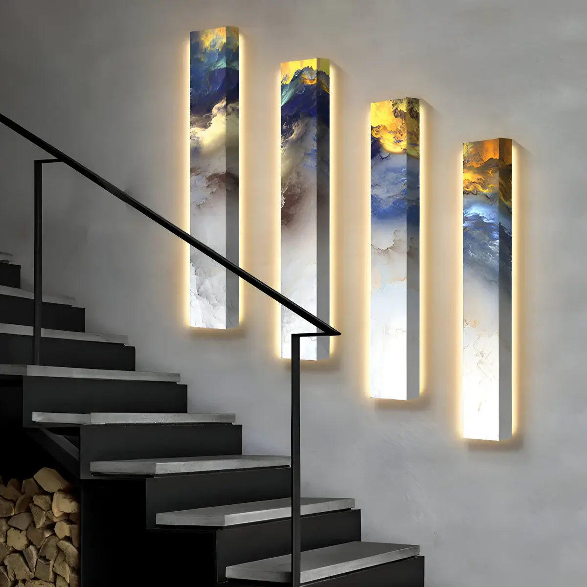 A staircase area featuring four vertical abstract wall panels with blue, gold, and white tones, enhanced by subtle backlighting.