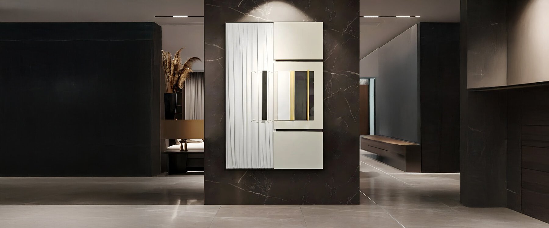 A sleek, contemporary interior featuring a rectangular mirror with an asymmetrical geometric design, mounted on a dark marble wall, enhancing the luxurious ambiance.