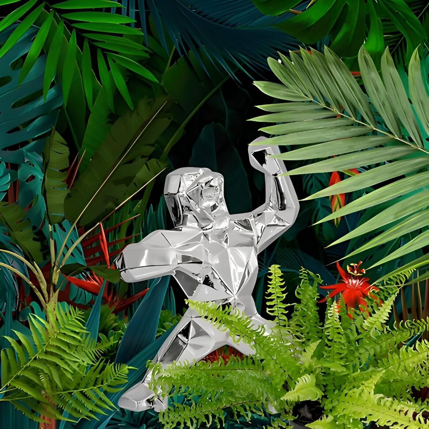 Polished chrome geometric gorilla sculpture, arm raised, set amid lush tropical foliage with ferns and palm leaves.
