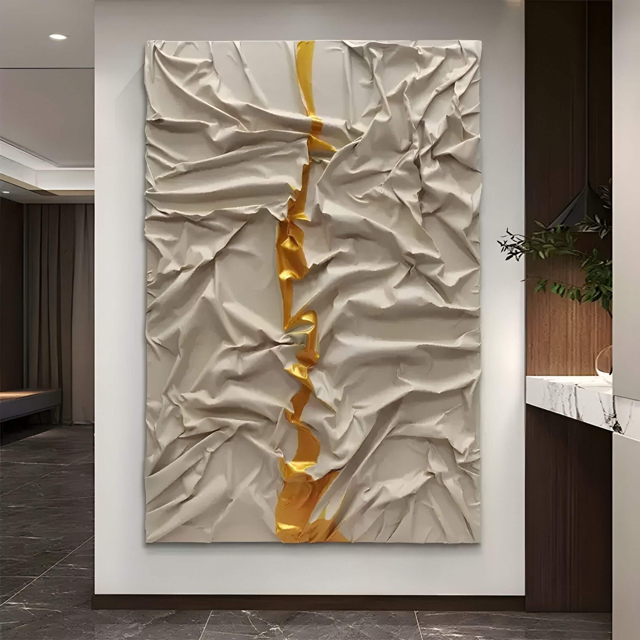 Cravyrn Beige & Gold Leather Hand-Painted 3D Wall Art displayed in a modern hallway, featuring sculptural beige folds with a striking vertical gold accent.