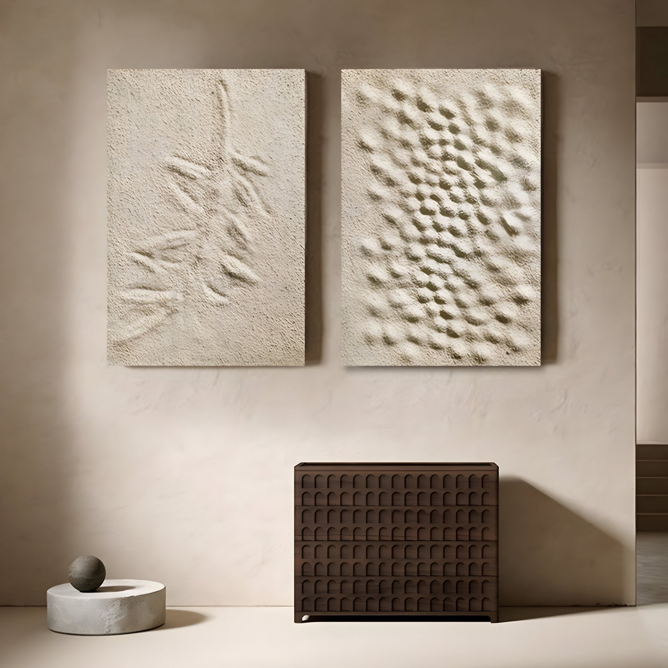 Neutral wabi sabi art set featuring organic leaf and ripple relief patterns in sandstone finish, displayed in a minimalist interior.