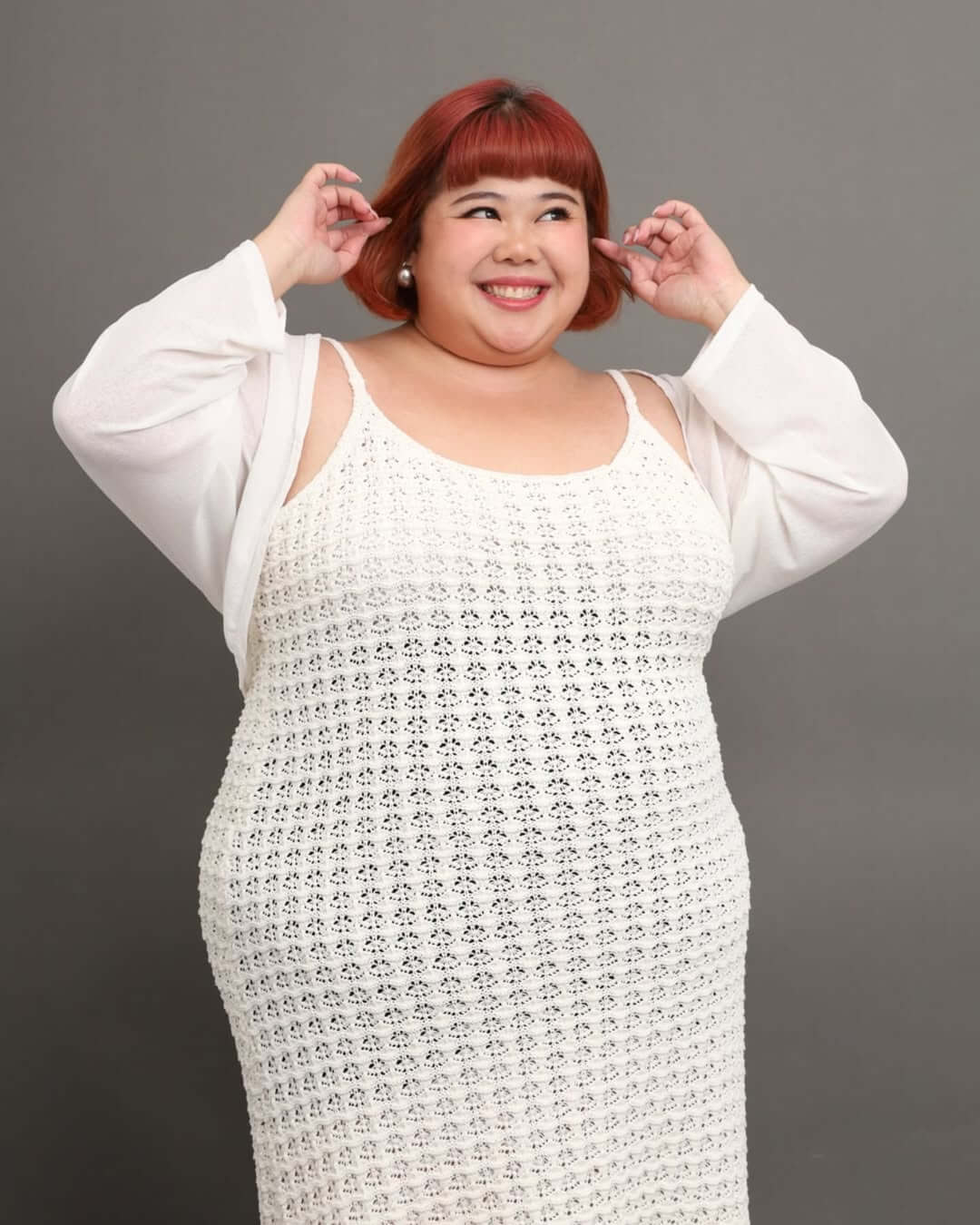 Priscilla Lim inspires with her bold style, including her iconic red hair, challenging beauty standards and encouraging body positivity.