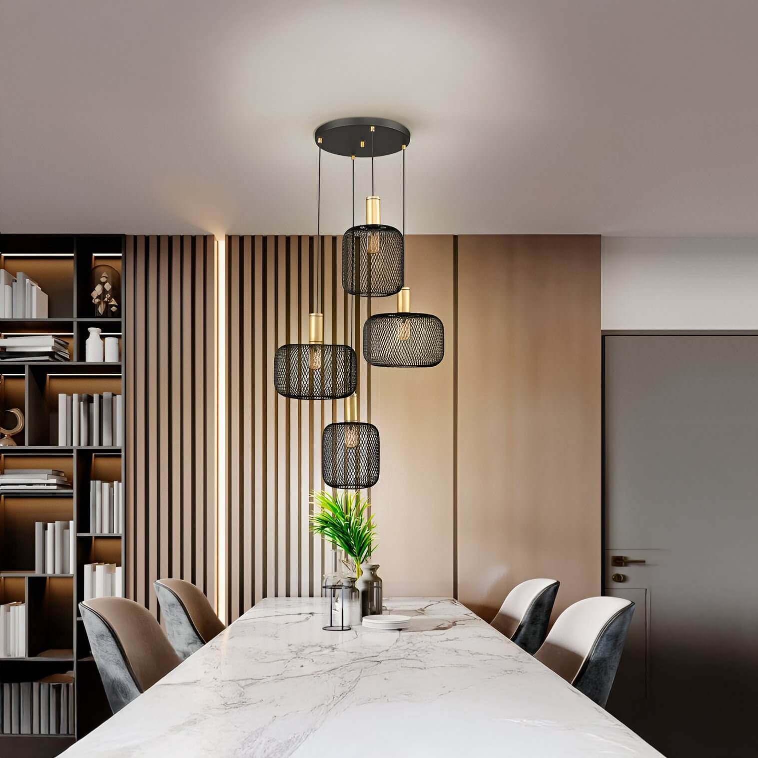 Multi-drop black mesh pendant lights with gold accents above a marble dining table in a contemporary space with wood panel walls.