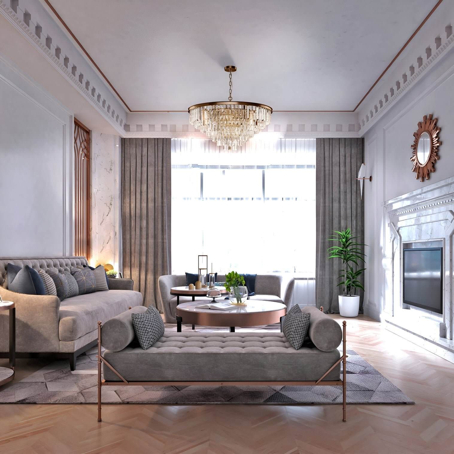 Classic gold crystal chandelier with tiered fringe design hangs in an elegant living room with marble fireplace.