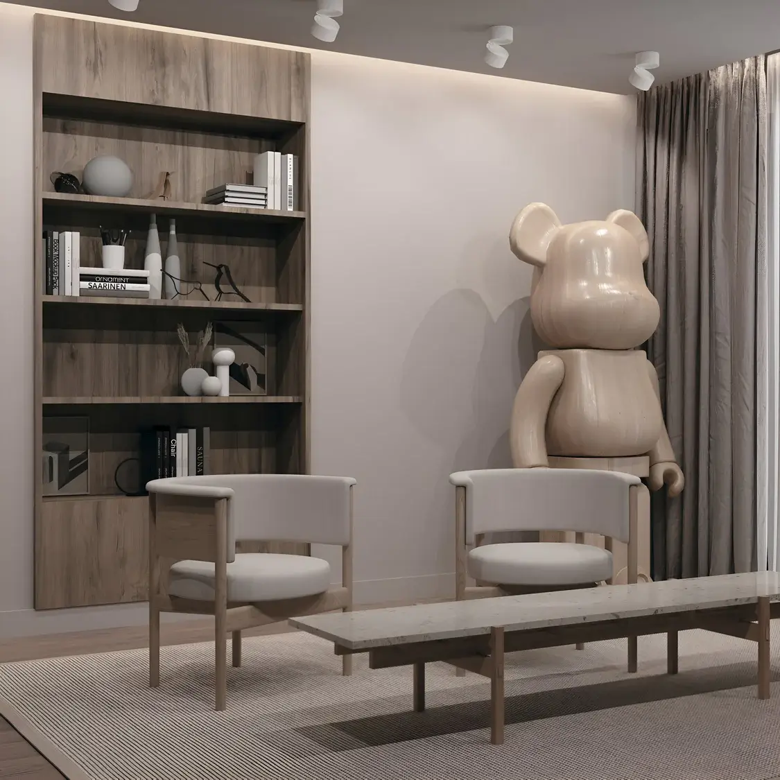  A cozy reading corner with a modern aesthetic. A wooden bookshelf displays books and decor items, accompanied by neutral-toned chairs and a playful oversized bear sculpture, all softly illuminated by white ceiling spotlights.