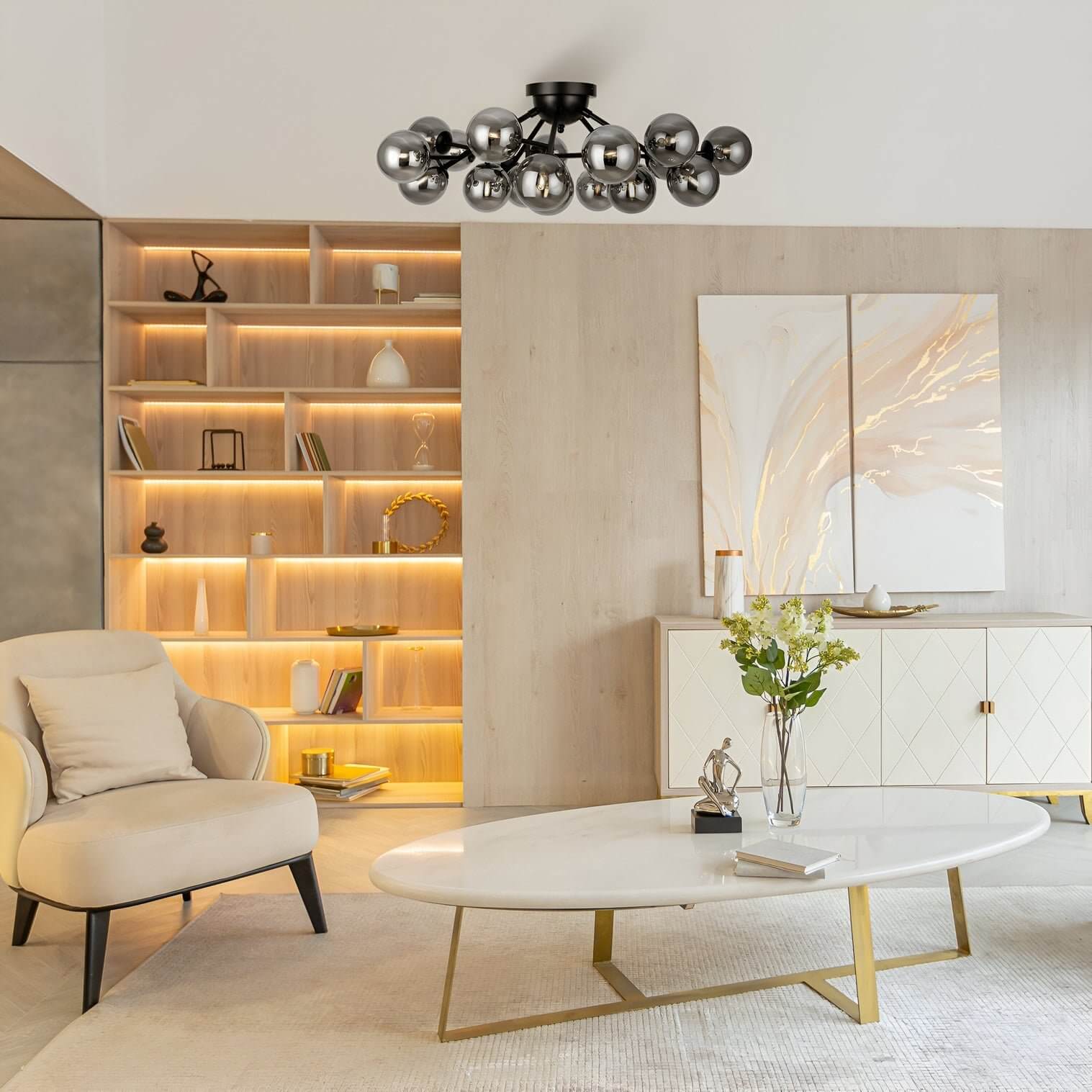 Contemporary lounge with backlit shelving, abstract wall art, and smoky glass ceiling light fixture