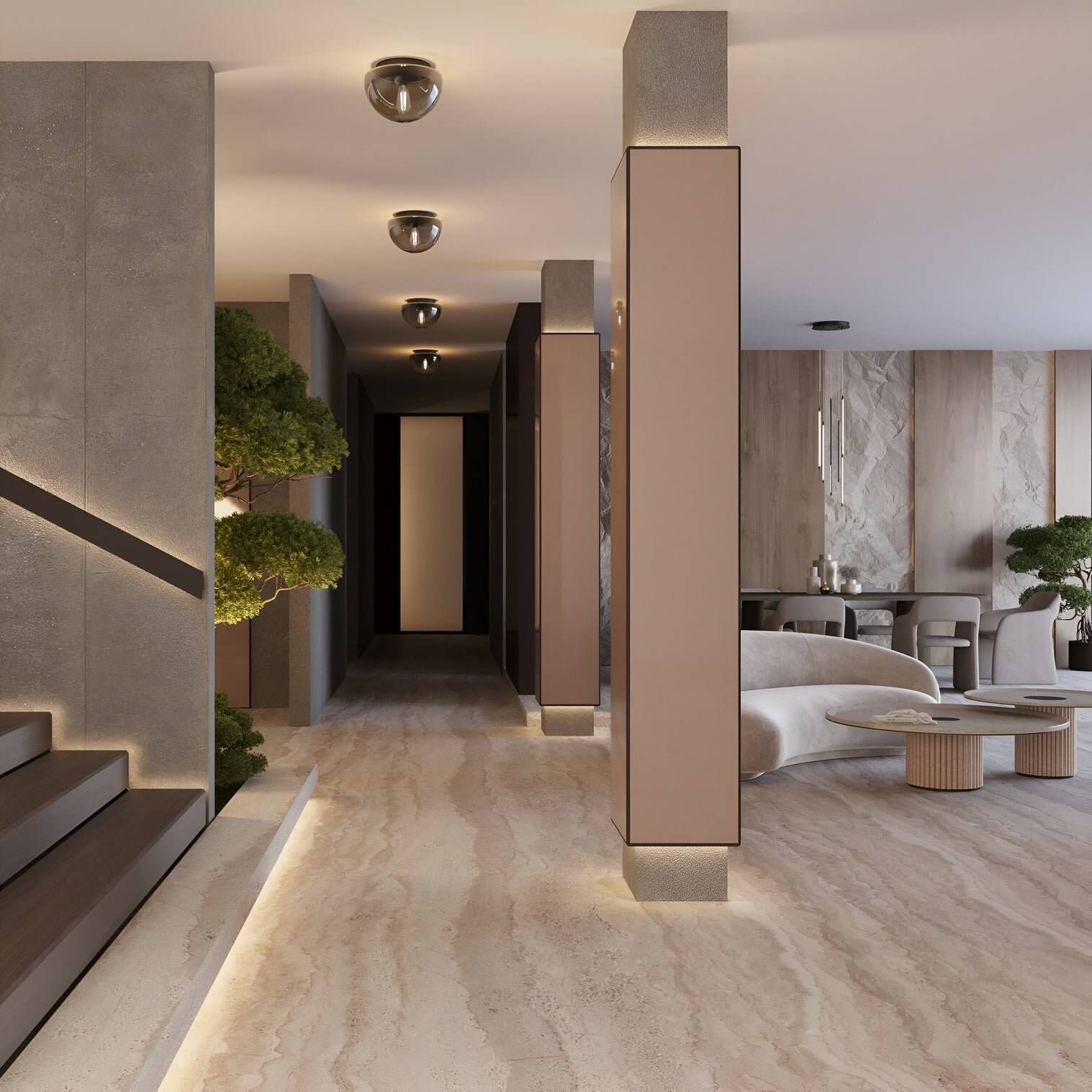 Neutral-toned hallway with dome ceiling lights, fluted columns, and stone-effect floors leading to open-plan seating