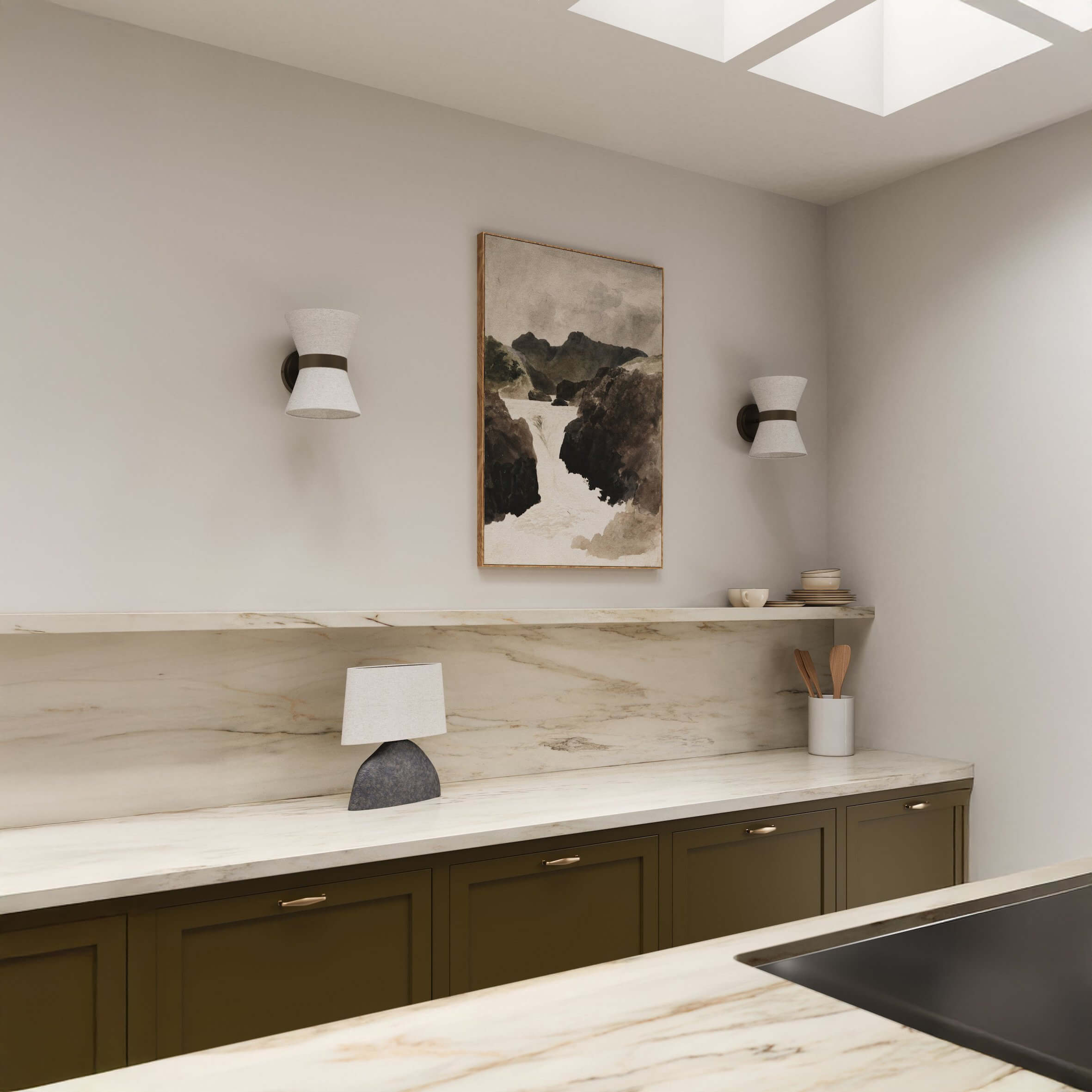 White conical wall sconces with black mounts above marble backsplash and olive green cabinetry in a minimalist kitchen.